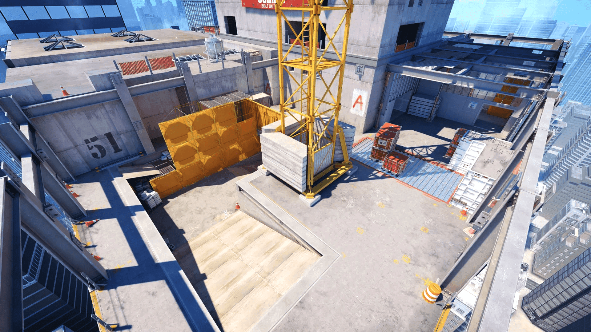 This high-angle shot captures a detailed rooftop construction site, bustling with activity and industrial elements. A prominent yellow crane stands tall, surrounded by building materials, storage containers, and scaffolding, all under the bright daylight. The number '51' is visible on a concrete wall, adding a touch of mystery to this urban landscape.